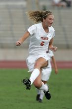 UT freshman Lucy Keith (#6, Midfielder) in mid-jump in the second half.  The University of Texas women's soccer team won 2-1 against the Iowa State Cyclones Sunday afternoon, October 5, 2008.