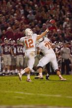 The University of Texas, Austin played Texas A&M in football at Kyle Field, College Station, on November 23, 2007.  UT lost to the Aggies, 30 to 38.

Filename: SRM_20071123_1909488.jpg
Aperture: f/2.8
Shutter Speed: 1/500
Body: Canon EOS-1D Mark II
Lens: Canon EF 300mm f/2.8 L IS