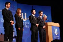 Former President Bill Clinton hands out commitment certificates to CGIU attendees for their exceptional pledges to the CGI cause during the opening plenary session of the CGIU meeting. Day one of the 2nd Annual Clinton Global Initiative University (CGIU) meeting was held at The University of Texas at Austin, Friday, February 13, 2009. Former President Bill Clinton hands out commitment certificates to CGIU attendees for their exceptional pledges to the CGI cause during the opening plenary session of the CGIU meeting. Day one of the 2nd Annual Clinton Global Initiative University (CGIU) meeting was held at The University of Texas at Austin, Friday, February 13, 2009.