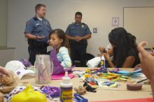 Officer Wesley Schlather talks about the UT RAD program at a domestic violence expressive arts workshop for survivors and friends of survivors of domestic and relationship violence.
Filename: SRM_20061023_1816443.jpg
Aperture: f/5.6
Shutter Speed: 1/100
Body: Canon EOS 20D
Lens: Canon EF-S 18-55mm f/3.5-5.6