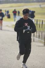 Larry Bright, 1:33:49, finishing the Decker Challenge 20K 2006 road race.

Filename: SRM_20061203_0938247.jpg
Aperture: f/4.0
Shutter Speed: 1/640
Body: Canon EOS-1D Mark II
Lens: Canon EF 80-200mm f/2.8 L