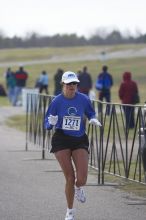 Kathy Cleary, 1:37:50, finishing the Decker Challenge 20K 2006 road race.

Filename: SRM_20061203_0941441.jpg
Aperture: f/4.0
Shutter Speed: 1/640
Body: Canon EOS-1D Mark II
Lens: Canon EF 80-200mm f/2.8 L