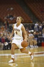 Guard Erika Arriaran, #4.  The lady longhorns defeated the Oral Roberts University's (ORU) Golden Eagles 79-40 Saturday night.

Filename: SRM_20061125_1354163.jpg
Aperture: f/2.8
Shutter Speed: 1/400
Body: Canon EOS-1D Mark II
Lens: Canon EF 80-200mm f/2.8 L