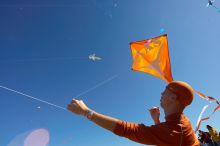 Chris Lam attempts to fly his UT kite at the 79th annual Zilker Park Kite Festival, Sunday, March 4, 2007.

Filename: SRM_20070304_1531563.jpg
Aperture: f/11.0
Shutter Speed: 1/250
Body: Canon EOS-1D Mark II
Lens: Sigma 15-30mm f/3.5-4.5 EX Aspherical DG DF