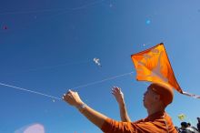 Chris Lam attempts to fly his UT kite at the 79th annual Zilker Park Kite Festival, Sunday, March 4, 2007.

Filename: SRM_20070304_1531585.jpg
Aperture: f/11.0
Shutter Speed: 1/250
Body: Canon EOS-1D Mark II
Lens: Sigma 15-30mm f/3.5-4.5 EX Aspherical DG DF