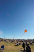 Madhav Tadikonda, class of 1997, and Anjali Patel, class of 1999, fly a UT kite at the 79th annual Zilker Park Kite Festival, Sunday, March 4, 2007.

Filename: SRM_20070304_1540389.jpg
Aperture: f/11.0
Shutter Speed: 1/250
Body: Canon EOS-1D Mark II
Lens: Sigma 15-30mm f/3.5-4.5 EX Aspherical DG DF