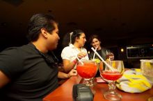 Simon Ortega, Sabrina Garza, and Madi Houston enjoying the party. Alpha Xi Delta held a sock hop themed date night at the Austin 300 bowling alley, Thursday night, March 29, 2007.
Filename: SRM_20070329_2106220.jpg
Aperture: f/6.3
Shutter Speed: 1/200
Body: Canon EOS-1D Mark II
Lens: Sigma 15-30mm f/3.5-4.5 EX Aspherical DG DF