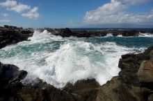 Hike to the Nakalele blowholes along the surf-beaten lava formations.

Filename: SRM_20071219_1227077.jpg
Aperture: f/8.0
Shutter Speed: 1/5000
Body: Canon EOS-1D Mark II
Lens: Sigma 15-30mm f/3.5-4.5 EX Aspherical DG DF