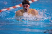 UT senior Agustin Magruder took second in the 100 yard breaststroke with a time of 56.67.  The University of Texas Longhorns defeated The University of Georgia Bulldogs 157-135 on Saturday, January 12, 2008.

Filename: SRM_20080112_1124588.jpg
Aperture: f/2.8
Shutter Speed: 1/400
Body: Canon EOS-1D Mark II
Lens: Canon EF 300mm f/2.8 L IS