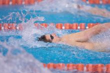 UT junior Michael Klueh took second in the 200 yard backstrong with a time of 1:50.70.  The University of Texas Longhorns defeated The University of Georgia Bulldogs 157-135 on Saturday, January 12, 2008.

Filename: SRM_20080112_1157460.jpg
Aperture: f/2.8
Shutter Speed: 1/400
Body: Canon EOS-1D Mark II
Lens: Canon EF 300mm f/2.8 L IS