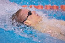 UT senior Matthew McGinnis took first in the 200 yard backstroke with a time of 1:47.37.  The University of Texas Longhorns defeated The University of Georgia Bulldogs 157-135 on Saturday, January 12, 2008.

Filename: SRM_20080112_1158544.jpg
Aperture: f/2.8
Shutter Speed: 1/400
Body: Canon EOS-1D Mark II
Lens: Canon EF 300mm f/2.8 L IS