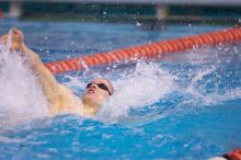 UT senior Matthew McGinnis took first in the 200 yard backstroke with a time of 1:47.37.  The University of Texas Longhorns defeated The University of Georgia Bulldogs 157-135 on Saturday, January 12, 2008.

Filename: SRM_20080112_1159069.jpg
Aperture: f/2.8
Shutter Speed: 1/400
Body: Canon EOS-1D Mark II
Lens: Canon EF 300mm f/2.8 L IS