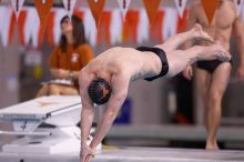 UT senior Matthew Lowe took first in the 200 yard breaststroke with a time of 2:01.46.  The University of Texas Longhorns defeated The University of Georgia Bulldogs 157-135 on Saturday, January 12, 2008.

Filename: SRM_20080112_1200200.jpg
Aperture: f/2.8
Shutter Speed: 1/400
Body: Canon EOS-1D Mark II
Lens: Canon EF 300mm f/2.8 L IS