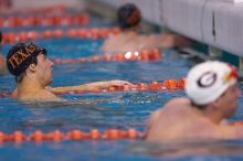 UT sophomore Ricky Berens took first  in the 500 yard freestyle with a time of 4:27.92.  The University of Texas Longhorns defeated The University of Georgia Bulldogs 157-135 on Saturday, January 12, 2008.

Filename: SRM_20080112_1208327.jpg
Aperture: f/2.8
Shutter Speed: 1/400
Body: Canon EOS-1D Mark II
Lens: Canon EF 300mm f/2.8 L IS