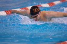 UT sophomore Trey Hoover competed in the 400 yard IM with a time of 4:10.06.  The University of Texas Longhorns defeated The University of Georgia Bulldogs 157-135 on Saturday, January 12, 2008.

Filename: SRM_20080112_1238067.jpg
Aperture: f/2.8
Shutter Speed: 1/400
Body: Canon EOS-1D Mark II
Lens: Canon EF 300mm f/2.8 L IS