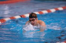 UT sophomore Trey Hoover competed in the 400 yard IM with a time of 4:10.06.  The University of Texas Longhorns defeated The University of Georgia Bulldogs 157-135 on Saturday, January 12, 2008.

Filename: SRM_20080112_1239465.jpg
Aperture: f/2.8
Shutter Speed: 1/400
Body: Canon EOS-1D Mark II
Lens: Canon EF 300mm f/2.8 L IS