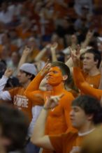 Dane Ehlert shows his school spirit before the Kansas basketball game.  The University of Texas (UT) Longhorns defeated the University of Kansas Jayhawks 72-69 in Austin, Texas on Monday, February 11, 2008.

Filename: SRM_20080211_2002445.jpg
Aperture: f/2.8
Shutter Speed: 1/640
Body: Canon EOS-1D Mark II
Lens: Canon EF 80-200mm f/2.8 L