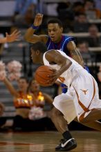 The University of Texas (UT) Longhorns defeated the University of Kansas Jayhawks 72-69 in Austin, Texas on Monday, February 11, 2008.

Filename: SRM_20080211_2023069.jpg
Aperture: f/3.2
Shutter Speed: 1/800
Body: Canon EOS 20D
Lens: Canon EF 300mm f/2.8 L IS