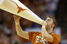 The University of Texas (UT) Longhorns defeated the University of Kansas Jayhawks 72-69 in Austin, Texas on Monday, February 11, 2008.

Filename: SRM_20080211_2132029.jpg
Aperture: f/2.8
Shutter Speed: 1/640
Body: Canon EOS 20D
Lens: Canon EF 300mm f/2.8 L IS