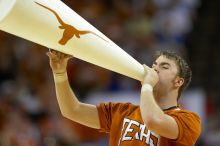 The University of Texas (UT) Longhorns defeated the University of Kansas Jayhawks 72-69 in Austin, Texas on Monday, February 11, 2008.

Filename: SRM_20080211_2132040.jpg
Aperture: f/2.8
Shutter Speed: 1/640
Body: Canon EOS 20D
Lens: Canon EF 300mm f/2.8 L IS