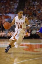 UT sophomore D.J. Augustin (#14, G) makes a drive.  The University of Texas (UT) Longhorns defeated the University of Kansas Jayhawks 72-69 in Austin, Texas on Monday, February 11, 2008.

Filename: SRM_20080211_2135065.jpg
Aperture: f/2.8
Shutter Speed: 1/640
Body: Canon EOS-1D Mark II
Lens: Canon EF 80-200mm f/2.8 L