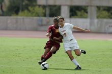 UT senior Stephanie Logterman (#10, Defender).  The University of Texas women's soccer team won 2-1 against the Iowa State Cyclones Sunday afternoon, October 5, 2008.

Filename: SRM_20081005_12221816.jpg
Aperture: f/5.0
Shutter Speed: 1/2500
Body: Canon EOS-1D Mark II
Lens: Canon EF 300mm f/2.8 L IS