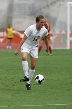 UT senior Kasey Moore (#14, Defender) in the second half.  The University of Texas women's soccer team won 2-1 against the Iowa State Cyclones Sunday afternoon, October 5, 2008.

Filename: SRM_20081005_13092432.jpg
Aperture: f/5.6
Shutter Speed: 1/2000
Body: Canon EOS-1D Mark II
Lens: Canon EF 300mm f/2.8 L IS