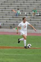 UT senior Kasey Moore (#14, Defender) takes the ball upfield in the second half.  The University of Texas women's soccer team won 2-1 against the Iowa State Cyclones Sunday afternoon, October 5, 2008.

Filename: SRM_20081005_13174856.jpg
Aperture: f/5.6
Shutter Speed: 1/1250
Body: Canon EOS-1D Mark II
Lens: Canon EF 300mm f/2.8 L IS