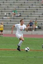 UT senior Kasey Moore (#14, Defender) takes the ball upfield in the second half.  The University of Texas women's soccer team won 2-1 against the Iowa State Cyclones Sunday afternoon, October 5, 2008.

Filename: SRM_20081005_13175059.jpg
Aperture: f/5.6
Shutter Speed: 1/1250
Body: Canon EOS-1D Mark II
Lens: Canon EF 300mm f/2.8 L IS