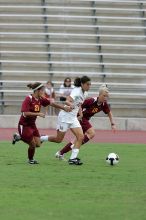 UT senior Stephanie Logterman (#10, Defender) in the second half.  The University of Texas women's soccer team won 2-1 against the Iowa State Cyclones Sunday afternoon, October 5, 2008.

Filename: SRM_20081005_13253899.jpg
Aperture: f/5.6
Shutter Speed: 1/1250
Body: Canon EOS-1D Mark II
Lens: Canon EF 300mm f/2.8 L IS