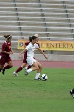 UT senior Stephanie Logterman (#10, Defender) in the second half.  The University of Texas women's soccer team won 2-1 against the Iowa State Cyclones Sunday afternoon, October 5, 2008.

Filename: SRM_20081005_13254002.jpg
Aperture: f/5.6
Shutter Speed: 1/1600
Body: Canon EOS-1D Mark II
Lens: Canon EF 300mm f/2.8 L IS