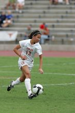 UT freshman Amanda Lisberger (#13, Midfielder) in the second half.  The University of Texas women's soccer team won 2-1 against the Iowa State Cyclones Sunday afternoon, October 5, 2008.

Filename: SRM_20081005_13340078.jpg
Aperture: f/5.6
Shutter Speed: 1/1250
Body: Canon EOS-1D Mark II
Lens: Canon EF 300mm f/2.8 L IS