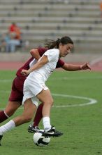 UT senior Stephanie Logterman (#10, Defender) in the second half.  The University of Texas women's soccer team won 2-1 against the Iowa State Cyclones Sunday afternoon, October 5, 2008.

Filename: SRM_20081005_13340691.jpg
Aperture: f/5.6
Shutter Speed: 1/1600
Body: Canon EOS-1D Mark II
Lens: Canon EF 300mm f/2.8 L IS