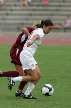 UT senior Stephanie Logterman (#10, Defender) in the second half.  The University of Texas women's soccer team won 2-1 against the Iowa State Cyclones Sunday afternoon, October 5, 2008.

Filename: SRM_20081005_13340694.jpg
Aperture: f/5.6
Shutter Speed: 1/1600
Body: Canon EOS-1D Mark II
Lens: Canon EF 300mm f/2.8 L IS