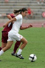 UT senior Stephanie Logterman (#10, Defender) in the second half.  The University of Texas women's soccer team won 2-1 against the Iowa State Cyclones Sunday afternoon, October 5, 2008.

Filename: SRM_20081005_13340895.jpg
Aperture: f/5.6
Shutter Speed: 1/1250
Body: Canon EOS-1D Mark II
Lens: Canon EF 300mm f/2.8 L IS