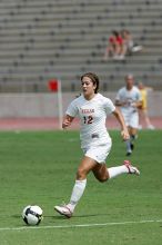 UT sophomore Alisha Ortiz (#12, Forward) in the second half.  The University of Texas women's soccer team won 2-1 against the Iowa State Cyclones Sunday afternoon, October 5, 2008.

Filename: SRM_20081005_13424463.jpg
Aperture: f/5.6
Shutter Speed: 1/2500
Body: Canon EOS-1D Mark II
Lens: Canon EF 300mm f/2.8 L IS