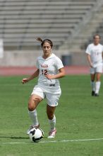 UT sophomore Alisha Ortiz (#12, Forward) in the second half.  The University of Texas women's soccer team won 2-1 against the Iowa State Cyclones Sunday afternoon, October 5, 2008.

Filename: SRM_20081005_13424667.jpg
Aperture: f/5.6
Shutter Speed: 1/2500
Body: Canon EOS-1D Mark II
Lens: Canon EF 300mm f/2.8 L IS