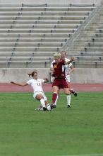 UT sophomore Alisha Ortiz (#12, Forward) slide tackles in the second half.  The University of Texas women's soccer team won 2-1 against the Iowa State Cyclones Sunday afternoon, October 5, 2008.

Filename: SRM_20081005_13441677.jpg
Aperture: f/5.6
Shutter Speed: 1/1600
Body: Canon EOS-1D Mark II
Lens: Canon EF 300mm f/2.8 L IS