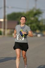 Beth Marek won first place in her age division at the Army Dillo half-marathon and 32K race.

Filename: SRM_20080921_0841364.jpg
Aperture: f/4.0
Shutter Speed: 1/2000
Body: Canon EOS-1D Mark II
Lens: Canon EF 300mm f/2.8 L IS