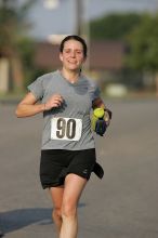 Beth Marek won first place in her age division at the Army Dillo half-marathon and 32K race.

Filename: SRM_20080921_0841400.jpg
Aperture: f/4.0
Shutter Speed: 1/2000
Body: Canon EOS-1D Mark II
Lens: Canon EF 300mm f/2.8 L IS