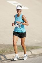 Karen Pearce placed second in her age groun at the Army Dillo half-marathon and 32K race.

Filename: SRM_20080921_0943561.jpg
Aperture: f/4.0
Shutter Speed: 1/2000
Body: Canon EOS-1D Mark II
Lens: Canon EF 300mm f/2.8 L IS