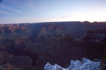 First sunrise of the new year at the south rim of the Grand Canyon, Thursday January 1, 2009.  The temperature was as low as 15 F the night before with a foot and a half of snow on the ground.  Luckily sunrise wasn't until 7:40.

Filename: SRM_20090101_07080687.JPG
Aperture: f/11.0
Shutter Speed: 25/1
Body: Canon EOS-1D Mark II
Lens: Canon EF 16-35mm f/2.8 L