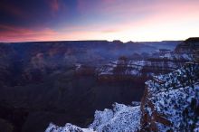 First sunrise of the new year at the south rim of the Grand Canyon, Thursday January 1, 2009.  The temperature was as low as 15 F the night before with a foot and a half of snow on the ground.  Luckily sunrise wasn't until 7:40.

Filename: SRM_20090101_07253397.JPG
Aperture: f/16.0
Shutter Speed: 6/1
Body: Canon EOS-1D Mark II
Lens: Canon EF 16-35mm f/2.8 L