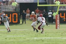 The University of Texas football team defeated the Arkansas Razorbacks with a score of 52-10 in Austin, TX on Saturday, September 27, 2008.

Filename: SRM_20080927_15341417.jpg
Aperture: f/5.6
Shutter Speed: 1/1600
Body: Canon EOS-1D Mark II
Lens: Canon EF 300mm f/2.8 L IS