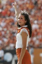 Texas Cheerleaders.  The University of Texas football team defeated the Arkansas Razorbacks with a score of 52-10 in Austin, TX on Saturday, September 27, 2008.

Filename: SRM_20080927_15401278.jpg
Aperture: f/5.6
Shutter Speed: 1/1250
Body: Canon EOS-1D Mark II
Lens: Canon EF 300mm f/2.8 L IS