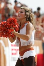 Texas Pom.  The University of Texas football team defeated the Arkansas Razorbacks with a score of 52-10 in Austin, TX on Saturday, September 27, 2008.

Filename: SRM_20080927_15415488.jpg
Aperture: f/5.6
Shutter Speed: 1/1250
Body: Canon EOS-1D Mark II
Lens: Canon EF 300mm f/2.8 L IS