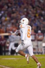 The University of Texas, Austin played Texas A&M in football at Kyle Field, College Station, on November 23, 2007.  UT lost to the Aggies, 30 to 38.

Filename: SRM_20071123_1821547.jpg
Aperture: f/2.8
Shutter Speed: 1/500
Body: Canon EOS-1D Mark II
Lens: Canon EF 300mm f/2.8 L IS