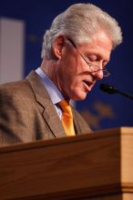 Former President Bill Clinton hands out commitment certificates to CGIU attendees for their exceptional pledges to the CGI cause during the opening plenary session of the CGIU meeting.  Day one of the 2nd Annual Clinton Global Initiative University (CGIU) meeting was held at The University of Texas at Austin, Friday, February 13, 2009.

Filename: SRM_20090213_16370969.jpg
Aperture: f/2.8
Shutter Speed: 1/250
Body: Canon EOS 20D
Lens: Canon EF 300mm f/2.8 L IS