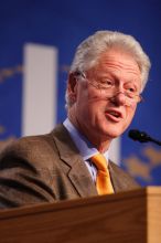 Former President Bill Clinton hands out commitment certificates to CGIU attendees for their exceptional pledges to the CGI cause during the opening plenary session of the CGIU meeting.  Day one of the 2nd Annual Clinton Global Initiative University (CGIU) meeting was held at The University of Texas at Austin, Friday, February 13, 2009.

Filename: SRM_20090213_16395189.jpg
Aperture: f/2.8
Shutter Speed: 1/250
Body: Canon EOS 20D
Lens: Canon EF 300mm f/2.8 L IS