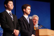 Former President Bill Clinton hands out commitment certificates to CGIU attendees for their exceptional pledges to the CGI cause during the opening plenary session of the CGIU meeting.  Day one of the 2nd Annual Clinton Global Initiative University (CGIU) meeting was held at The University of Texas at Austin, Friday, February 13, 2009.

Filename: SRM_20090213_16452208.jpg
Aperture: f/4.0
Shutter Speed: 1/125
Body: Canon EOS-1D Mark II
Lens: Canon EF 80-200mm f/2.8 L